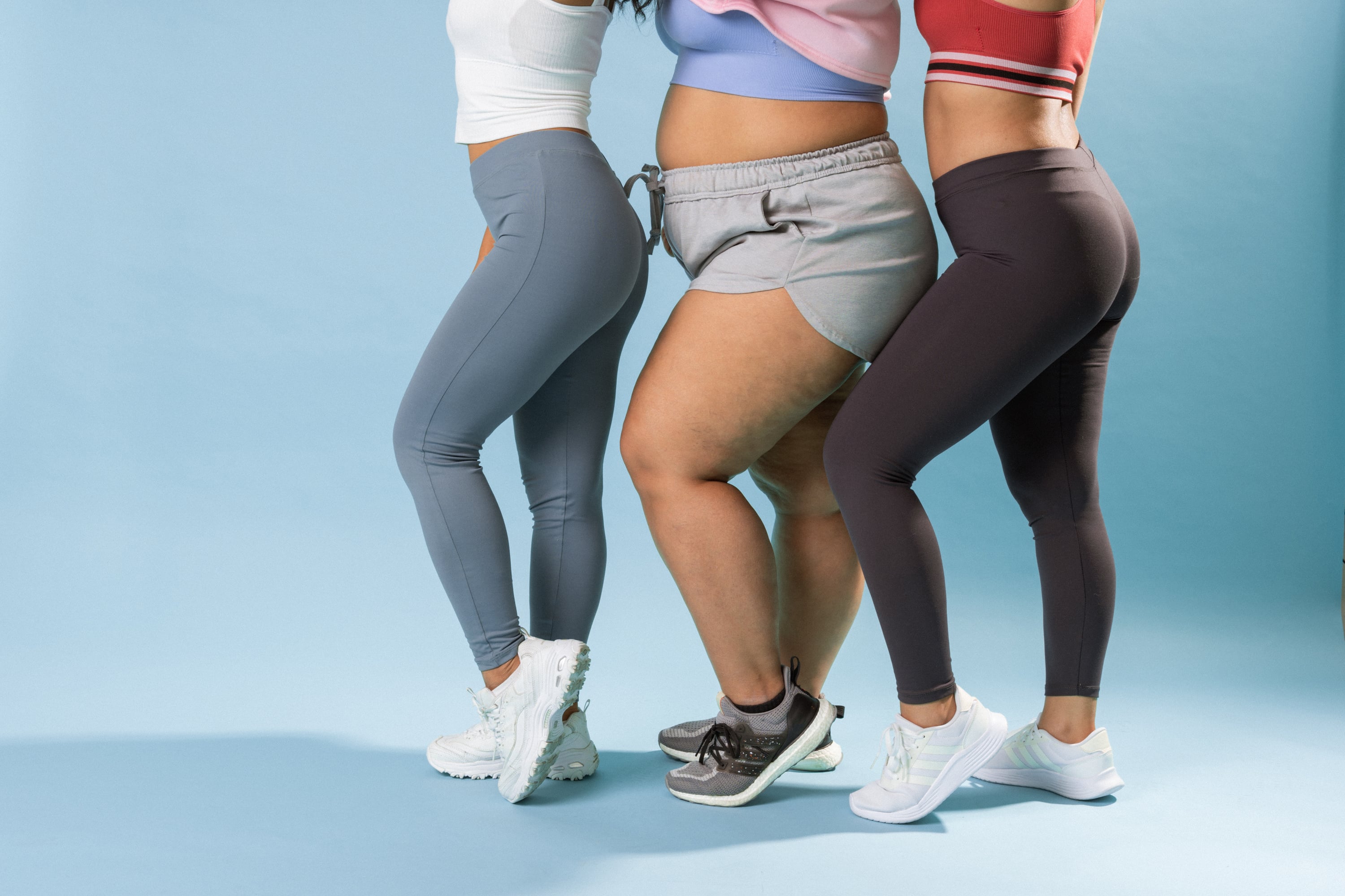 Women in Activewear on Blue Background